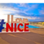 Photo du panneau "I Love Nice" avec la ville en fond